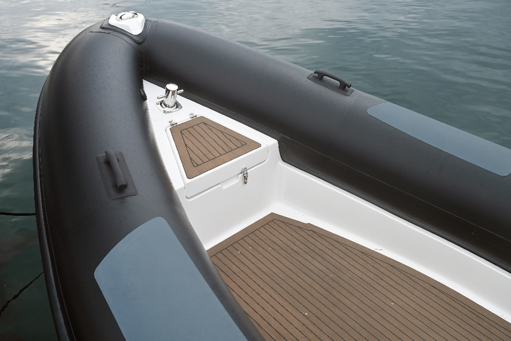 Redbay SF750 bow with samson post, fairlead and anchor locker hatch on faux-teak decking