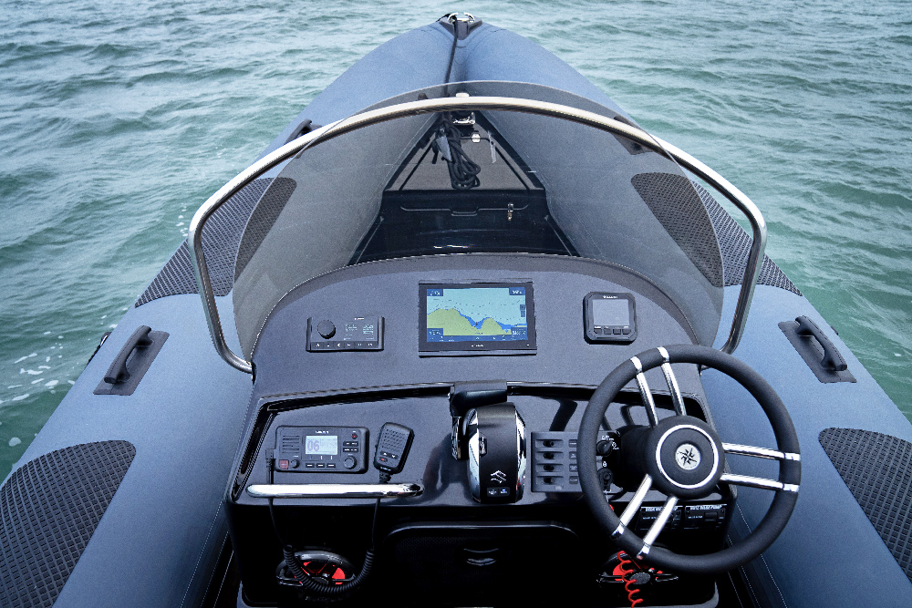 Redbay SF750 helm console with Garmin chartplotter, Suzuki digital gauge and steering wheel
