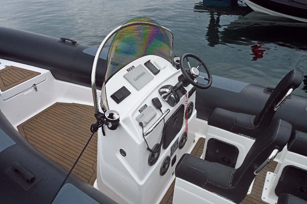Redbay SF750 helm console and windscreen with stainless-steel grab rail
