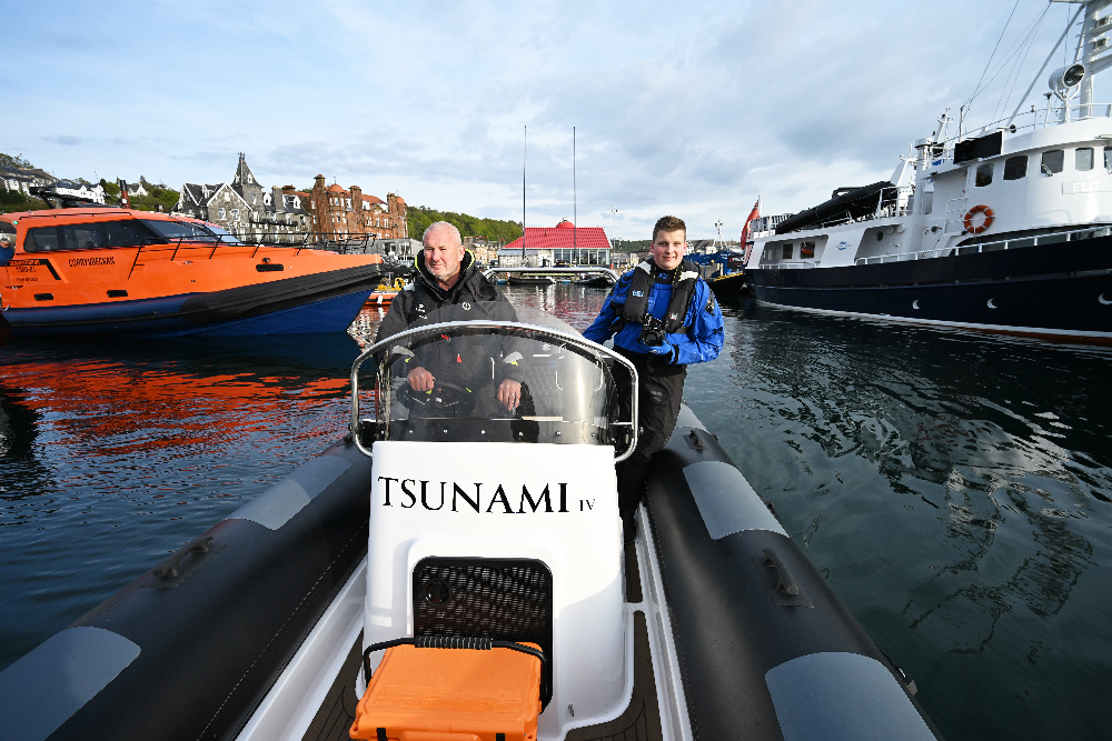 Two crew aboard the Redbay SF750 Tsunami in Oban harbour
